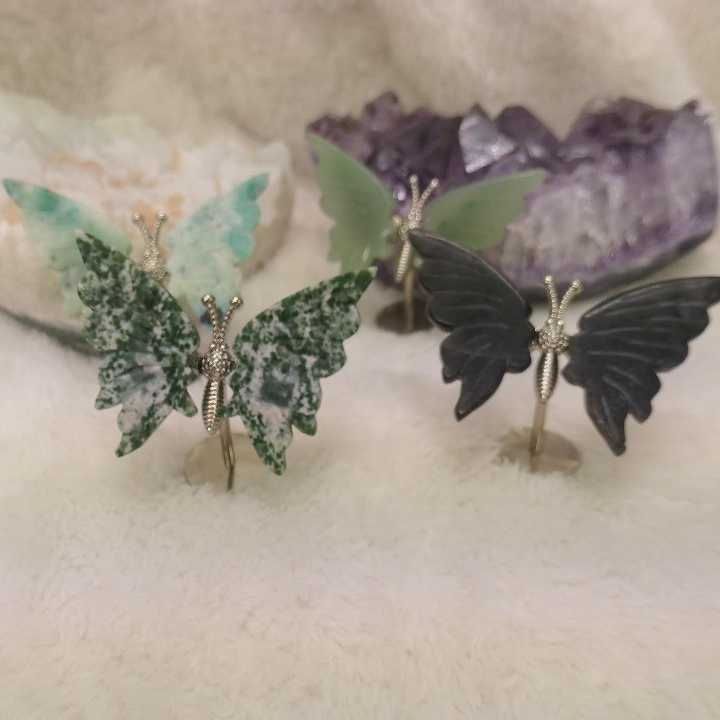 Butterfly on silver metal stand