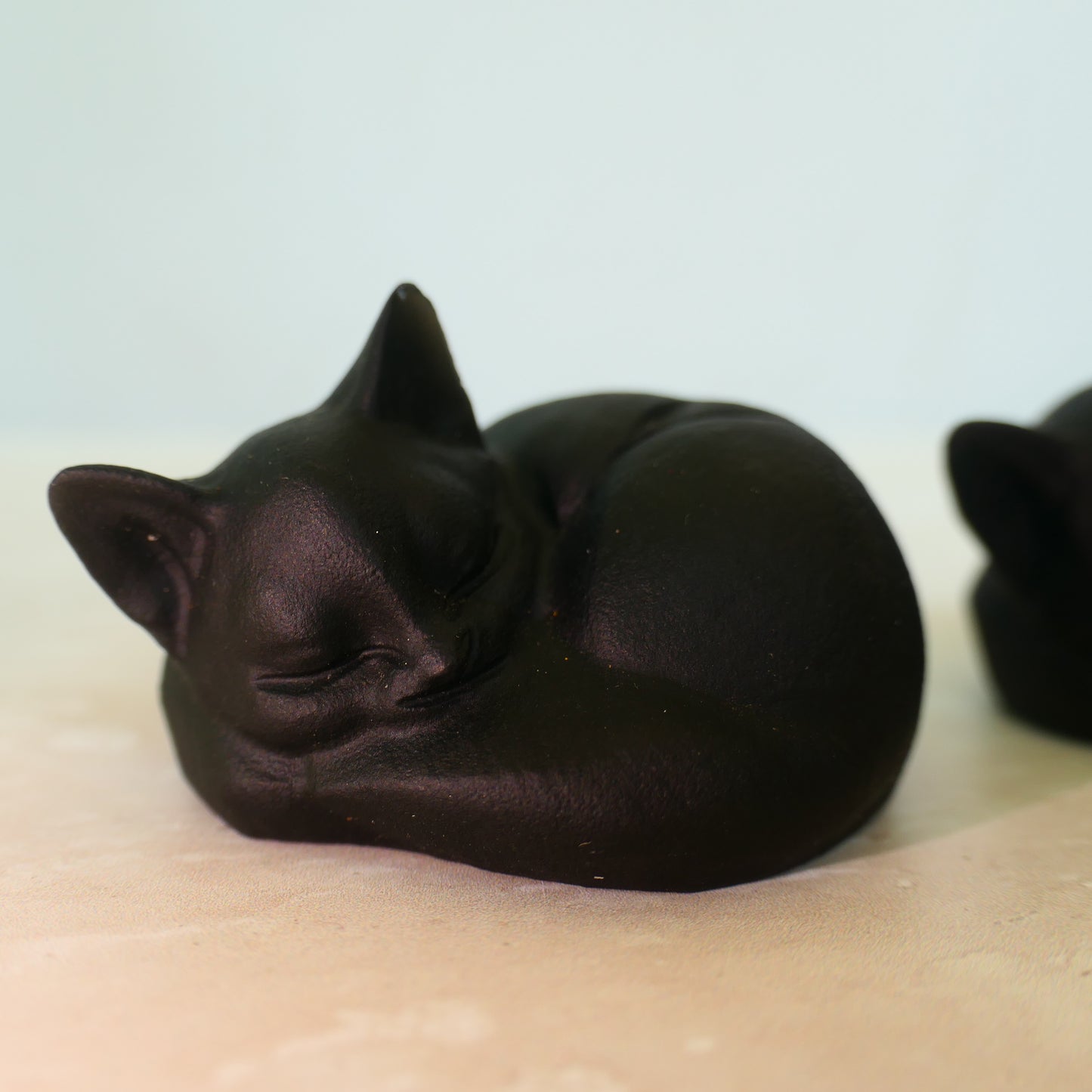 Black Obsidian Sleeping Cats