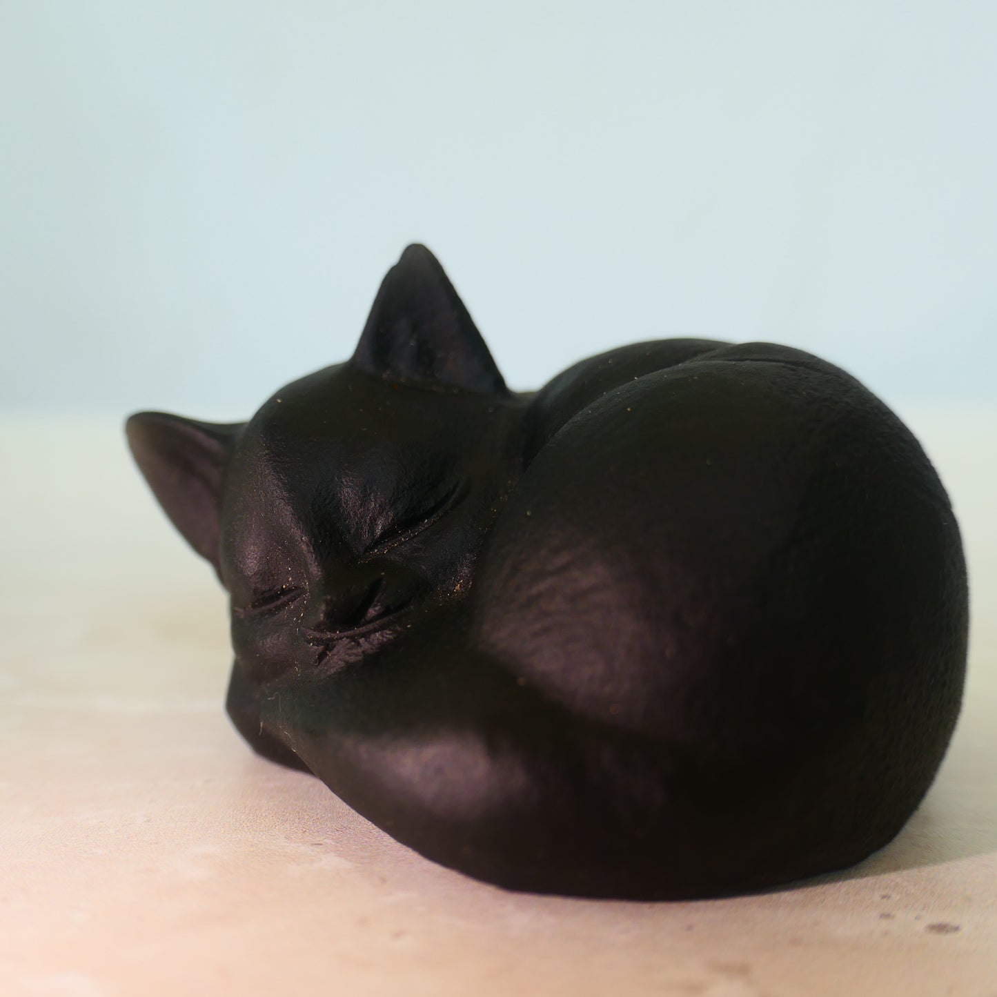 Black Obsidian Sleeping Cats